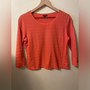 600 West women’s size medium coral colored top